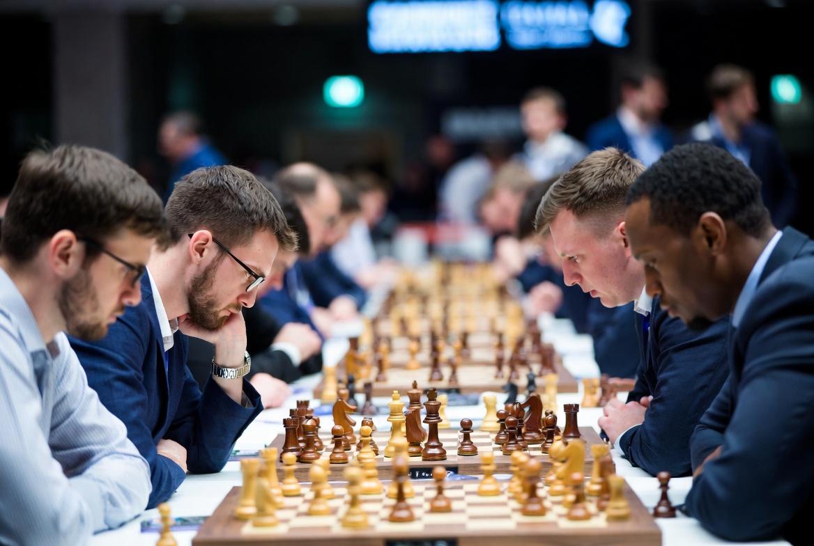 "Chess grandmasters in intense battle, showcasing strategic brilliance and focus."